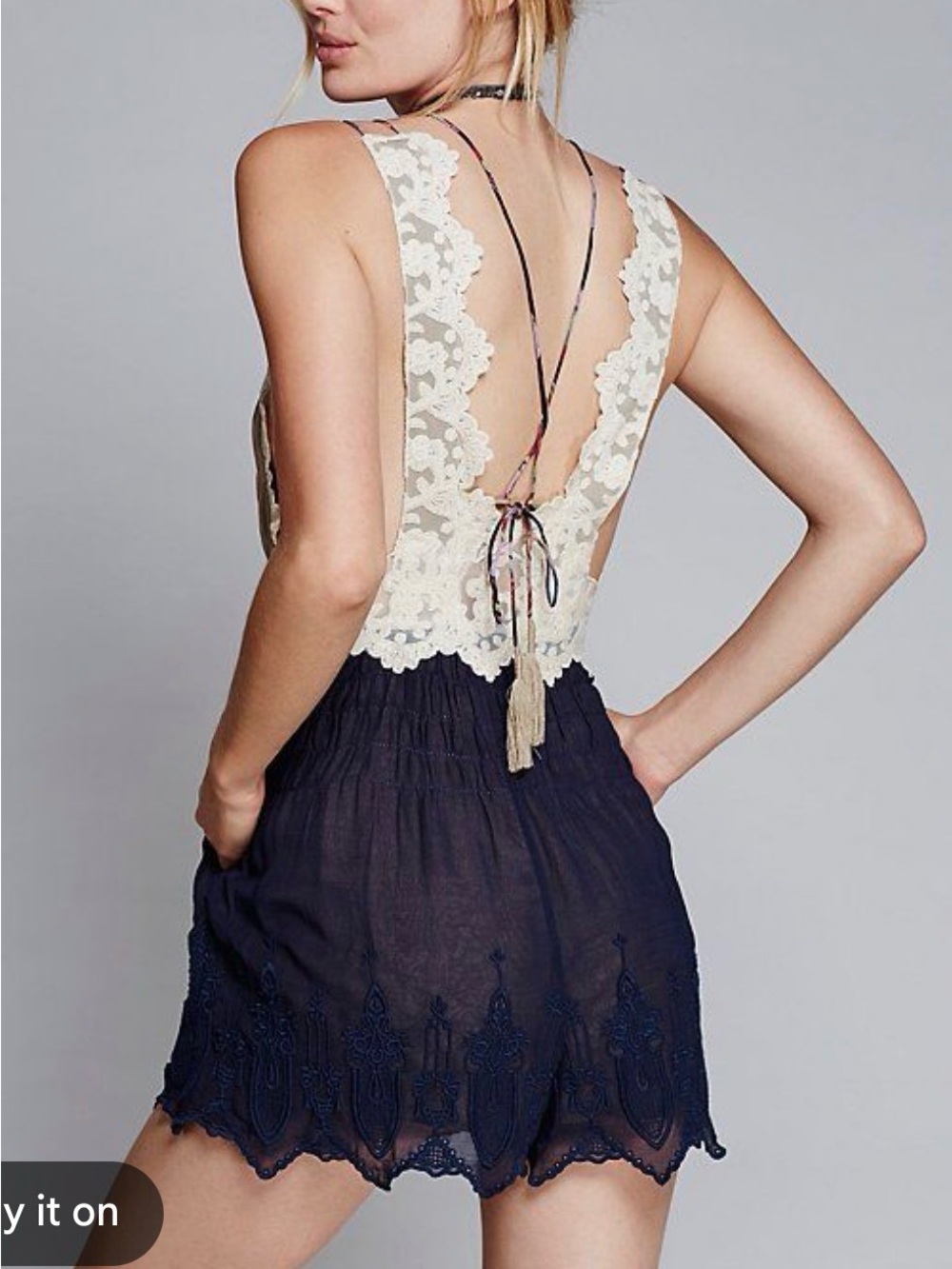 Free People Cream Lace Backless Romper with Navy Skirted Shorts